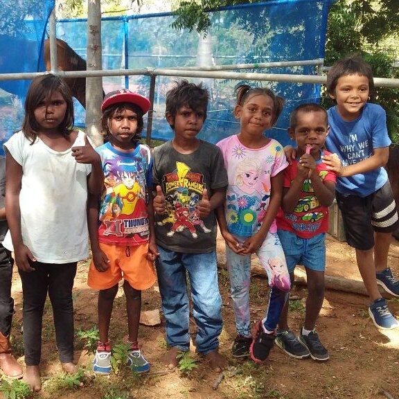 Six kids attending school with Children are Learning